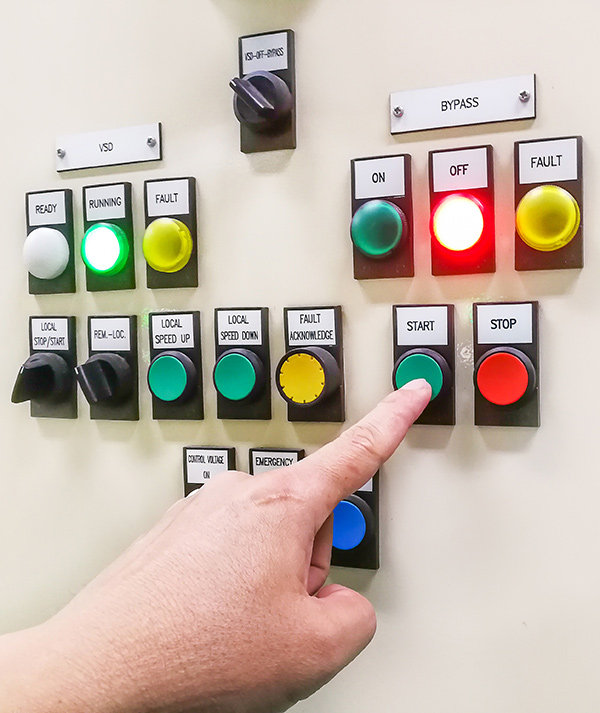 hand-holding-control-panel-industrial-plant-pushing-turning-button-electrical-selector-switch-button-switch-motor-control-center-cabinet-(1)